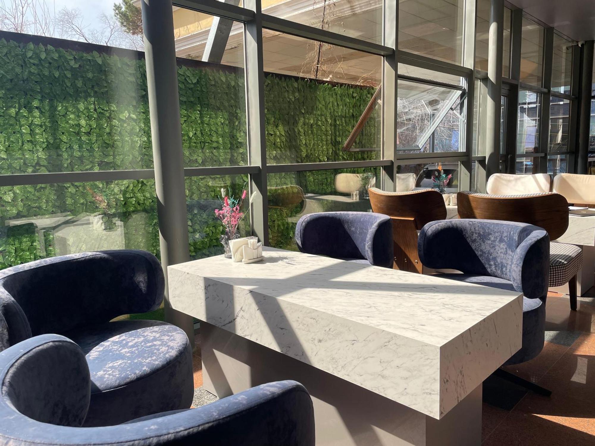 Aykun Hotel Alma-Ata Exteriör bild